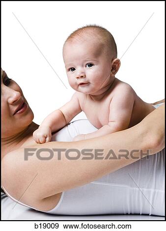 Woman and baby. View Large Photo Image Stock Photo - Woman and baby.. Fotosearch