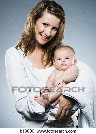 Woman and baby. View Large Photo Image Stock Photograph - Woman and baby.. Fotosearch