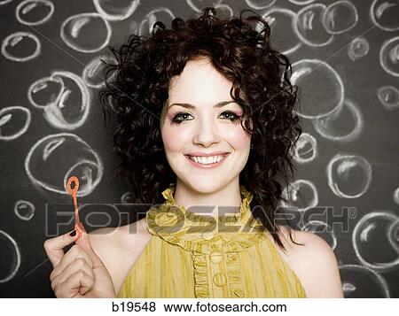 woman blowing bubbles View Large Photo Image Stock Photo - woman blowing bubbles. Fotosearch