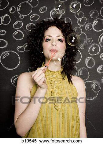 woman blowing bubbles View Large Photo Image Stock Photography - woman blowing bubbles. Fotosearch