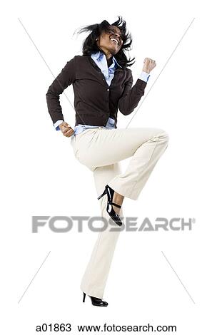 Stock Image - woman dancing. Fotosearch