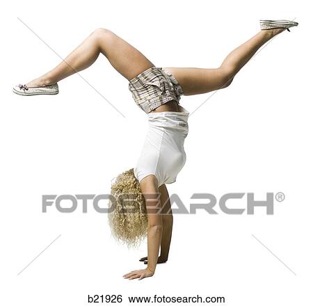 woman doing a hand stand View Large Photo Image Stock Photograph - woman doing a hand stand. Fotosearch