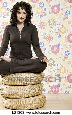 Stock Image - woman doing yoga. Fotosearch