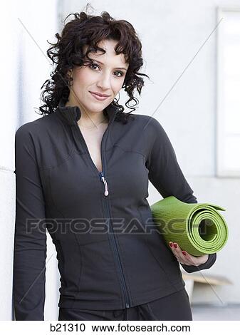 Stock Image - woman doing yoga. Fotosearch