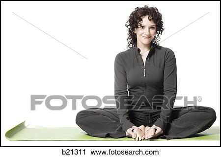 Stock Image - woman doing yoga. Fotosearch