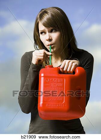 woman drinking gasoline View Large Photo Image Stock Photo - woman drinking gasoline. Fotosearch