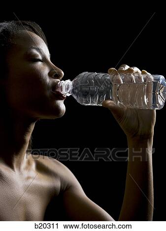 woman drinking water View Large Photo Image Stock Image - woman drinking water. Fotosearch
