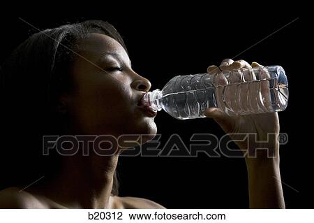 woman drinking water View Large Photo Image Stock Image - woman drinking water. Fotosearch