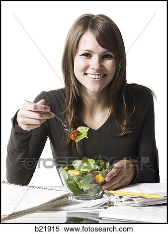 woman eating healthily View Large Photo Image Stock Photography - woman eating healthily. Fotosearch