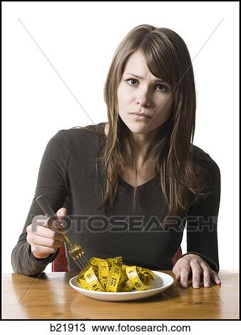 woman eating View Large Photo Image Stock Image - woman eating. Fotosearch