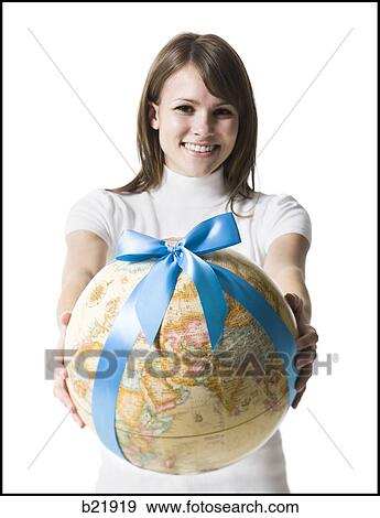 woman giving a globe View Large Photo Image Stock Photo - woman giving a globe. Fotosearch