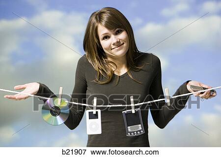 woman hanging electronics out to dry View Large Photo Image Stock Photo - woman hanging electronics out to dry. Fotosearch