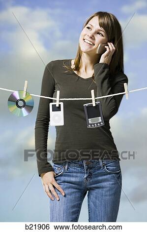 woman hanging electronics out to dry View Large Photo Image Stock Photograph - woman hanging electronics out to dry. Fotosearch