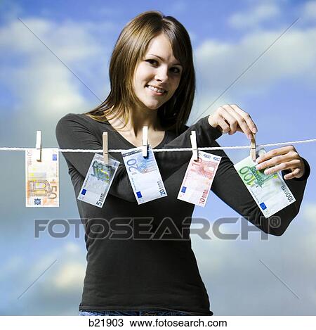 woman hanging money out to dry View Large Photo Image Stock Image - woman hanging money out to dry. Fotosearch