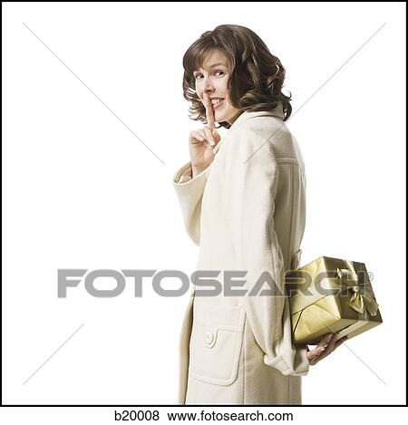 woman holding a gift View Large Photo Image Stock Photo - woman holding a gift. Fotosearch
