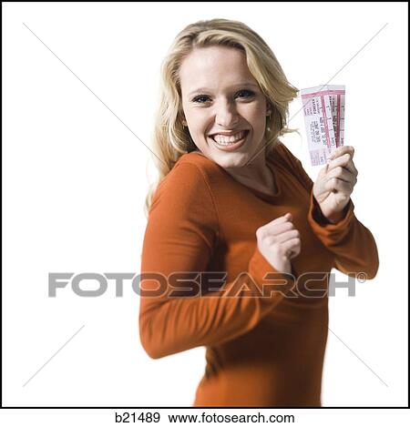 woman holding concert tickets View Large Photo Image Stock Photo - woman holding concert tickets. Fotosearch