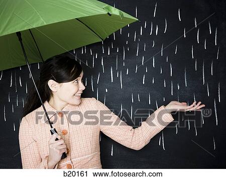 woman in a chalkboard rainstorm View Large Photo Image Stock Image - woman in a chalkboard rainstorm. Fotosearch