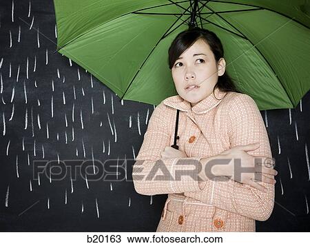 woman in a chalkboard rainstorm View Large Photo Image Stock Image - woman in a chalkboard rainstorm. Fotosearch