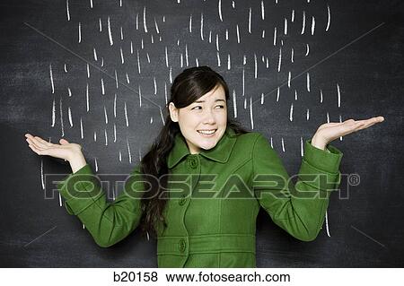 woman in a chalkboard rainstorm View Large Photo Image Stock Photo - woman in a chalkboard rainstorm. Fotosearch