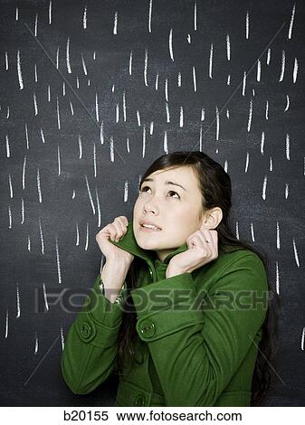 woman in a chalkboard rainstorm View Large Photo Image Stock Photography - woman in a chalkboard rainstorm. Fotosearch