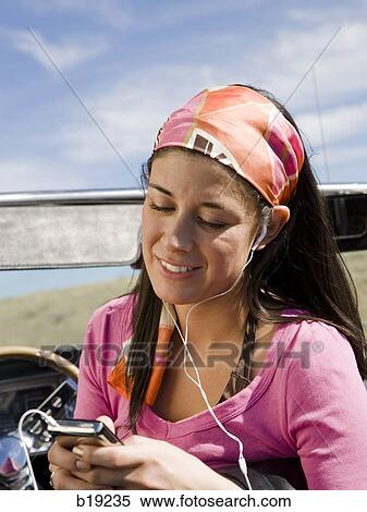 woman in a red convertible View Large Photo Image Stock Photography - woman in a red convertible. Fotosearch