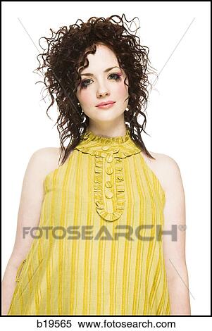 woman in a yellow dress View Large Photo Image Stock Photography - woman in a yellow dress. Fotosearch