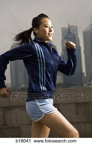 Woman jogging. View Large Photo Image Stock Image - Woman jogging.. Fotosearch