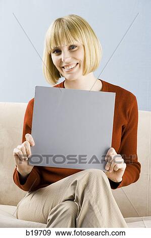 Stock Photo - woman looking at camera. Fotosearch