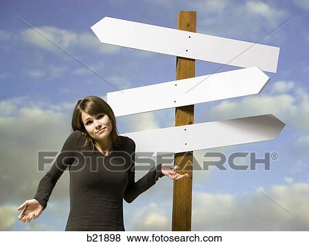 woman looking for directions View Large Photo Image Stock Photo - woman looking for directions. Fotosearch