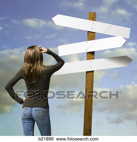 woman looking for directions View Large Photo Image Stock Photo - woman looking for directions. Fotosearch