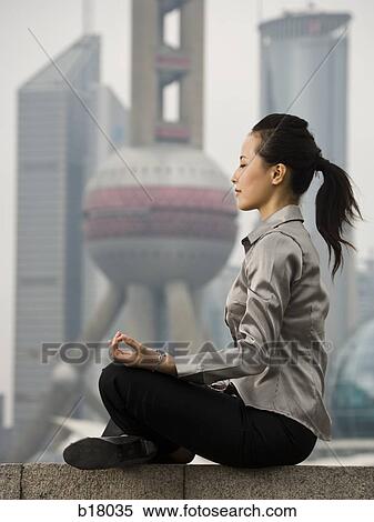 Stock Photography - Woman meditating.. Fotosearch