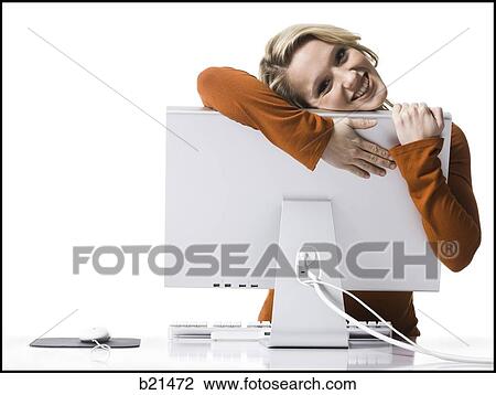 woman on a computer View Large Photo Image Stock Image - woman on a computer. Fotosearch