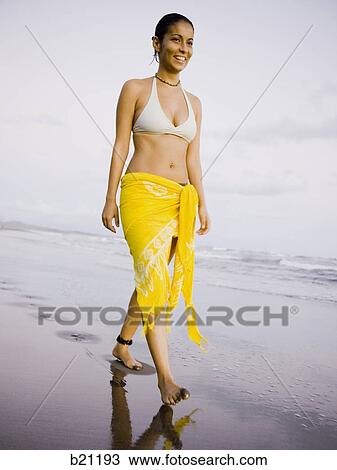Stock Image - woman on the beach. Fotosearch