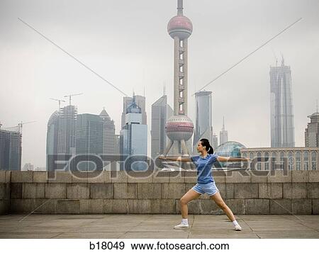 Stock Photo - Woman practicing Yoga.. Fotosearch