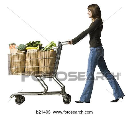 woman pushing a shopping cart View Large Photo Image Stock Image - woman pushing a shopping cart. Fotosearch