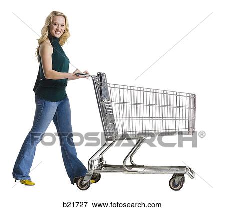 woman pushing a shopping cart View Large Photo Image Stock Photo - woman pushing a shopping cart. Fotosearch
