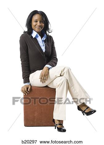 woman sitting on a box View Large Photo Image Stock Photo - woman sitting on a box. Fotosearch
