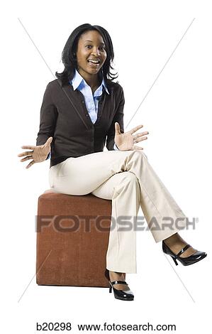 woman sitting on a box View Large Photo Image Stock Photo - woman sitting on a box. Fotosearch
