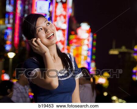 woman with a cell phone View Large Photo Image Stock Image - woman with a cell phone. Fotosearch