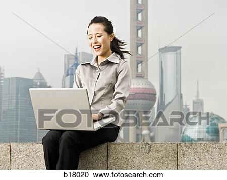 Woman with a notebook computer. View Large Photo Image Stock Image - Woman with a notebook computer.. Fotosearch