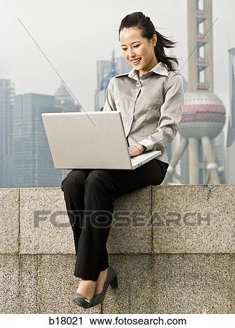 Woman with a notebook computer. View Large Photo Image Stock Image - Woman with a notebook computer.. Fotosearch