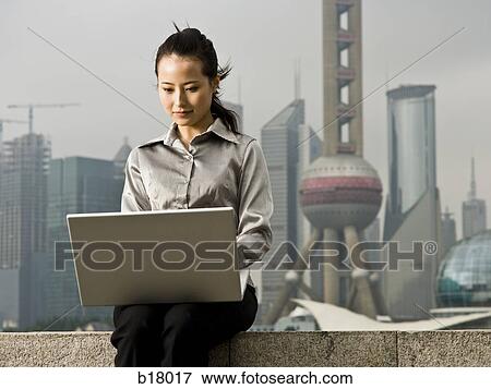 Woman with a notebook computer. View Large Photo Image Stock Photo - Woman with a notebook computer.. Fotosearch