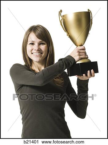 woman with a trophy View Large Photo Image Stock Image - woman with a trophy. Fotosearch