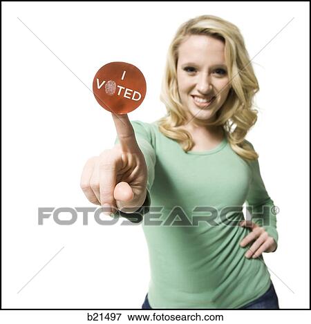 "woman with an ""i voted"" sticker" View Large Photo Image Stock Photo - "woman with an ""i voted"" sticker". Fotosearch