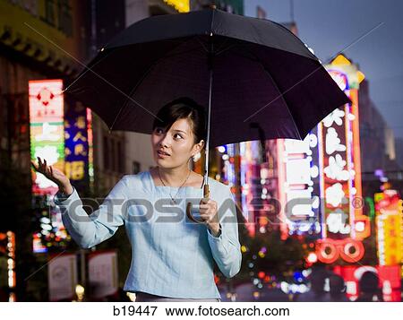 woman with an umbrella View Large Photo Image Stock Photo - woman with an umbrella. Fotosearch