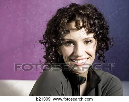 woman with curly brown hair View Large Photo Image Stock Photo - woman with curly brown hair. Fotosearch