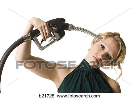 woman with gas pump to the head View Large Photo Image Stock Photo - woman with gas pump to the head. Fotosearch