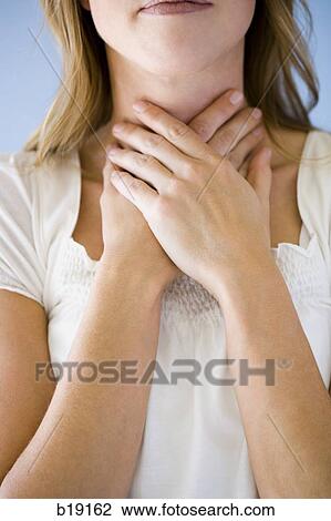 woman with hands on throat. View Large Photo Image Stock Image - woman with hands on throat.. Fotosearch