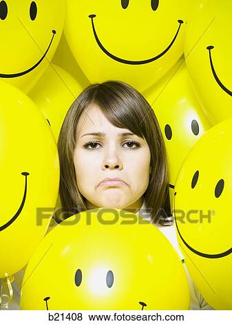 woman with smiley face balloons View Large Photo Image Stock Photo - woman with smiley face balloons. Fotosearch