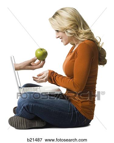 Stock Photo - woman working on a laptop. Fotosearch